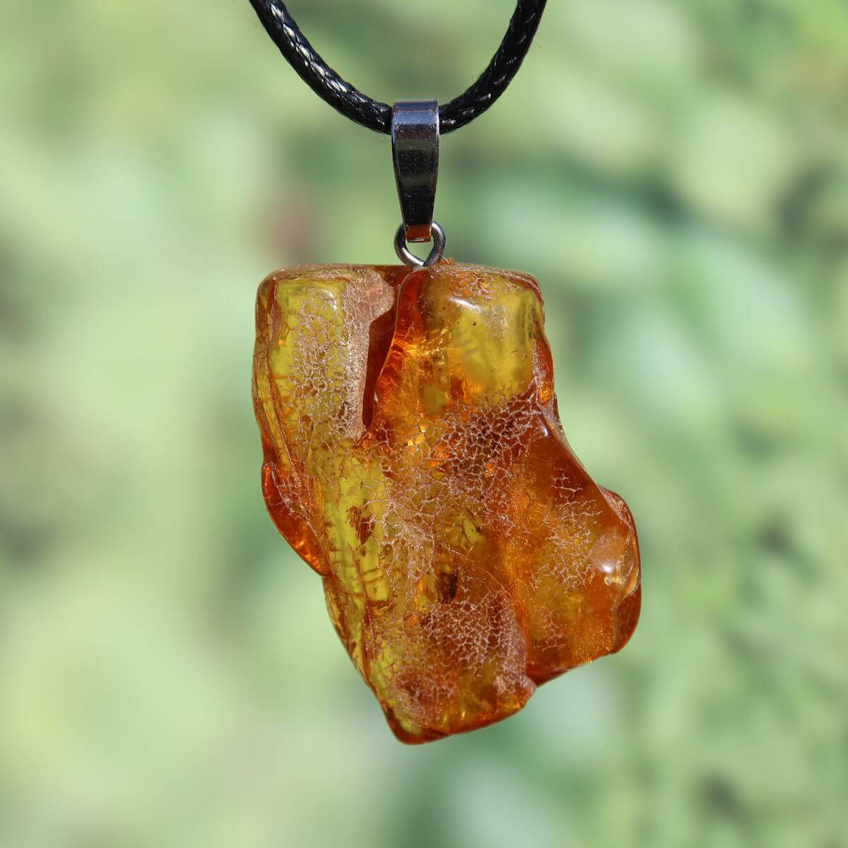 Natürlicher Bernstein Anhänger 40mm, einzigartig, mit leuchtender Transparenz und faszinierender Struktur, Unikat Nr. 8.