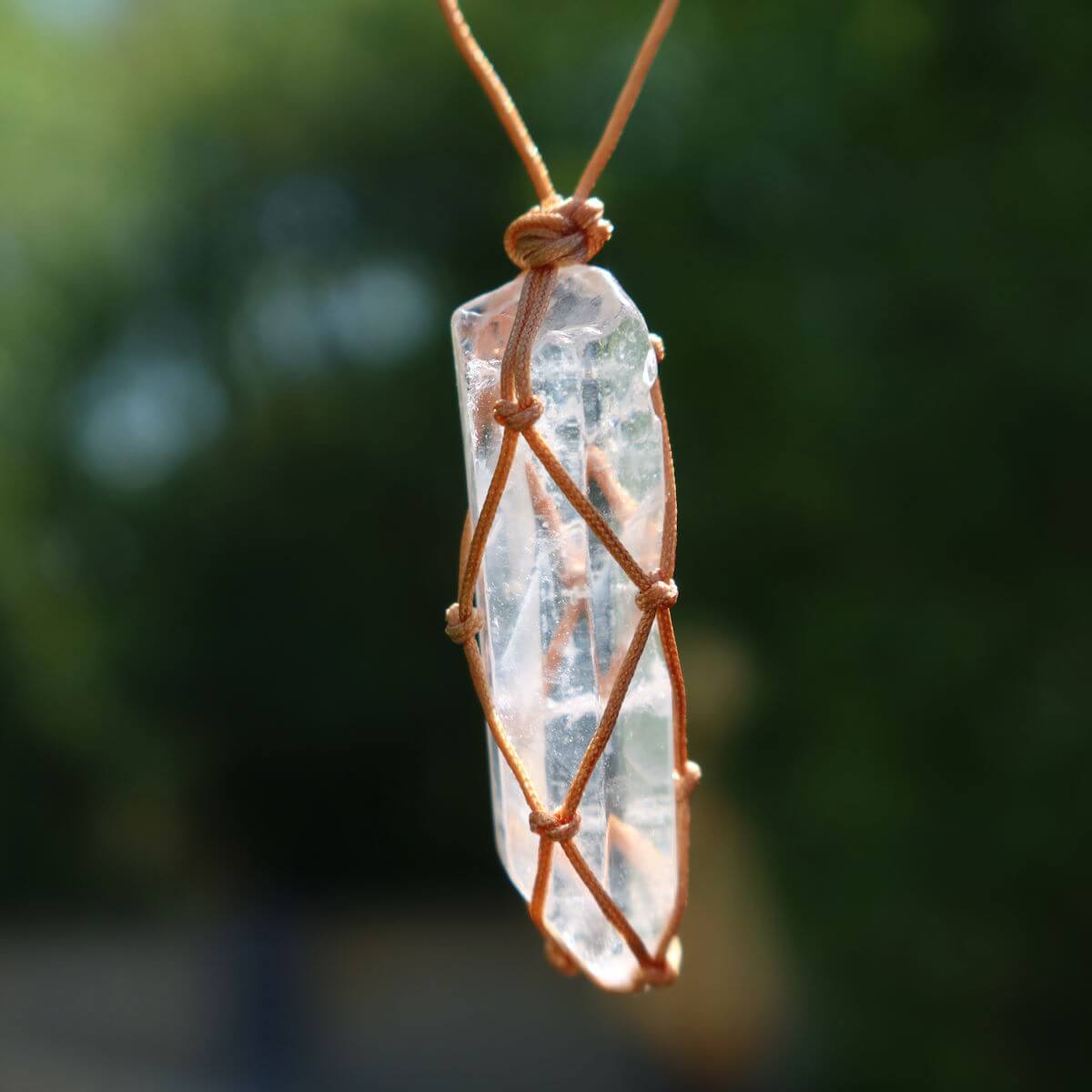 Handcrafted bergkristall pendant with adjustable macrame cord, unique design, genuine gemstone, artisan crafted for style and comfort.