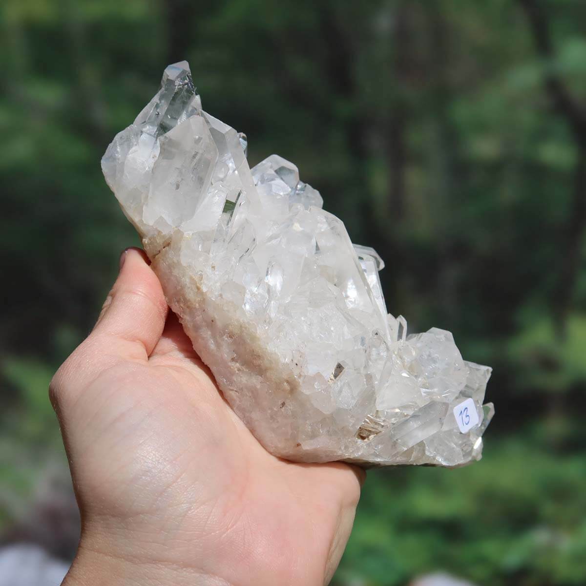 Hand holding Bergkristall Stufe, 1A Qualität, 0.6kg, unpolished crystal from Brazil, unique piece with clarity and focus, UNIKAT Nr. 13