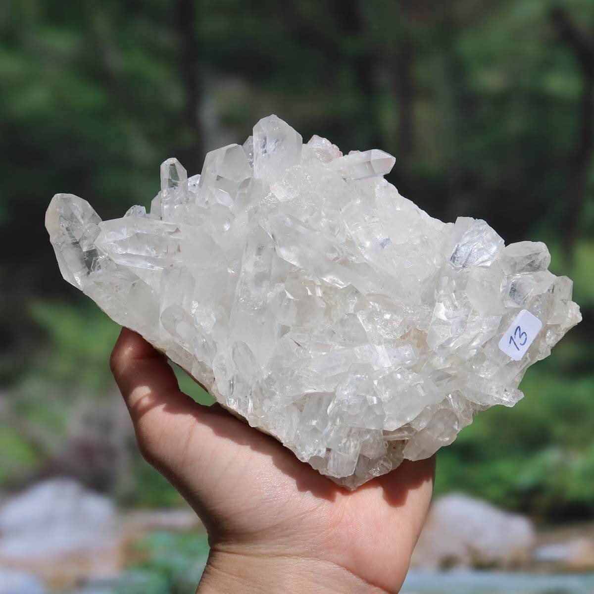Hand holding Bergkristall Stufe, 1A Qualität, 0.6kg, unpolished crystal from Brazil, unique piece with clarity and focus, UNIKAT Nr. 13