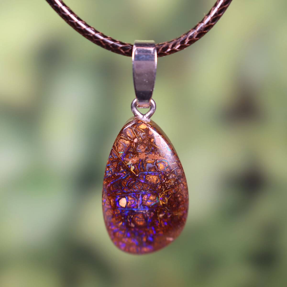 Unique Boulder Opal pendant with rhodium-plated silver clasp, hand-polished, natural Australian gemstone, size 26x12mm.