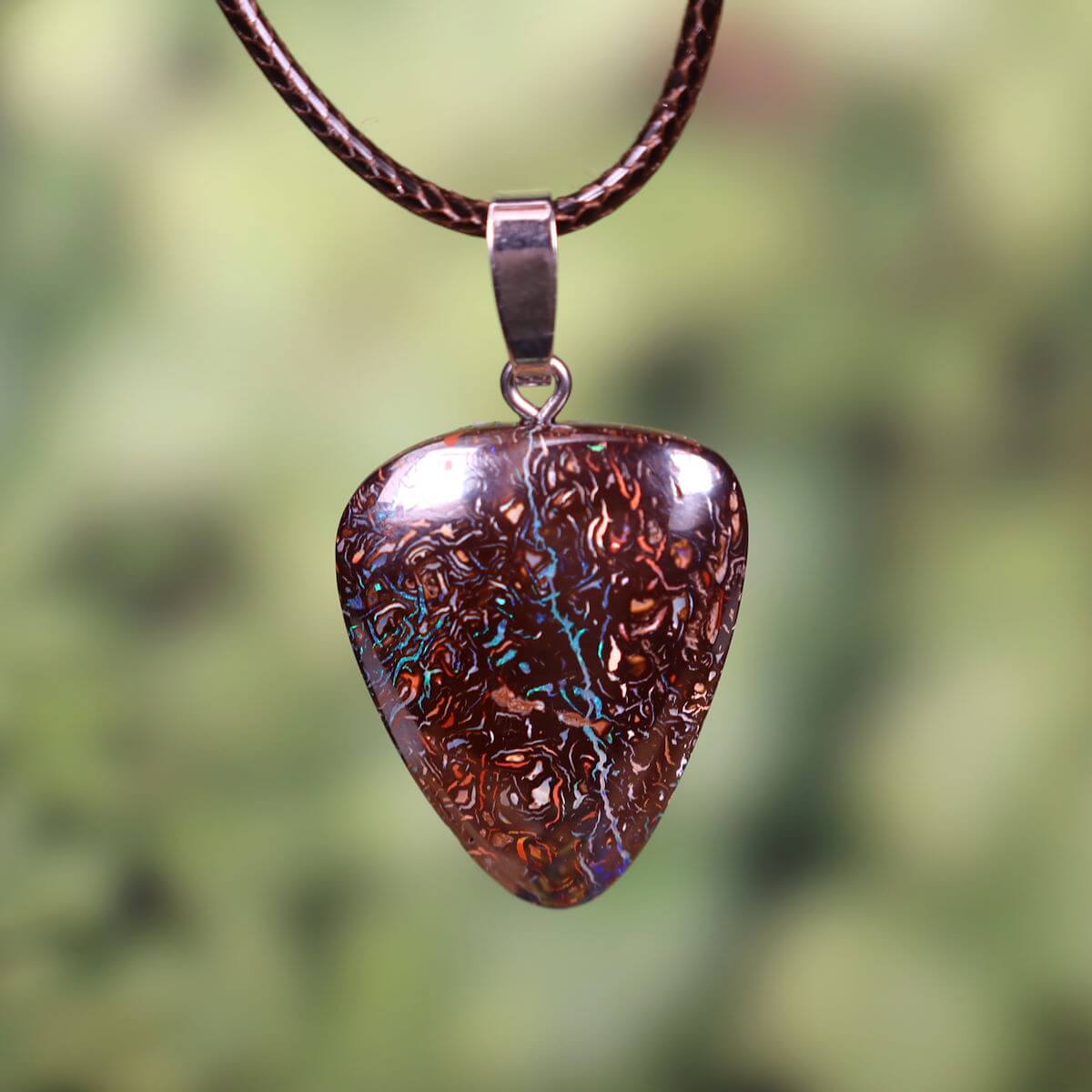 Boulder Opal Pendant with Rhodium Silver Loop, hand-polished, unique design from Australia, 30x24mm, symbolizes joy and ease.