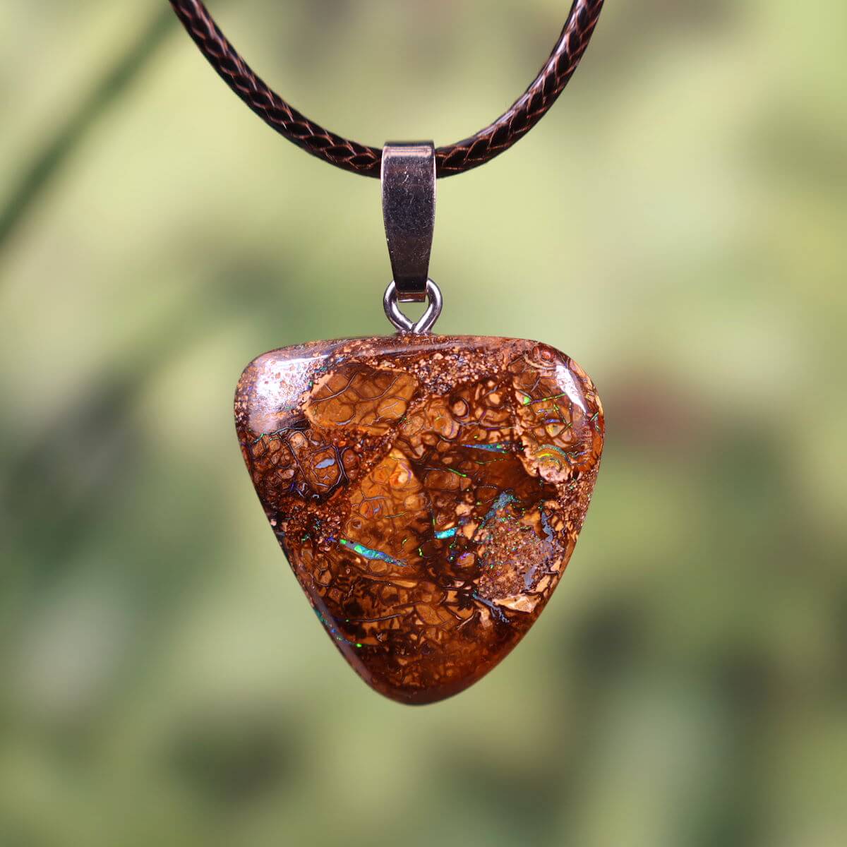 Boulder Opal pendant with silver loop, hand-polished gemstone, unique Australian opal jewelry, earthy tones, 26x25mm size.