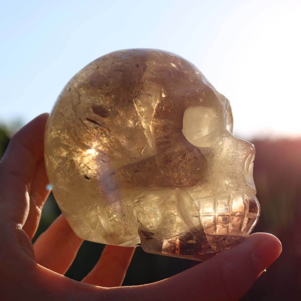 Handcrafted citrine crystal skull, 9x7 cm, unique gemstone piece, available in Graz and Wiener Neustadt. Ideal for collectors.