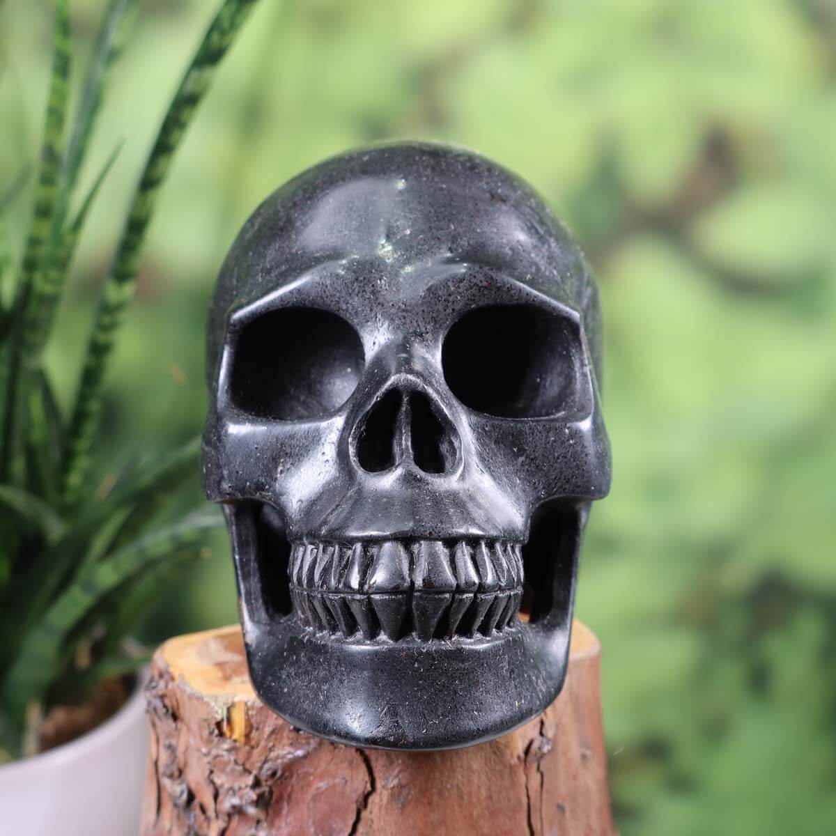 Handcrafted natural stone crystal skull, 12x10 cm, unique design, Vienna Minerals and Amethyst Druses, craftmanship showcase.