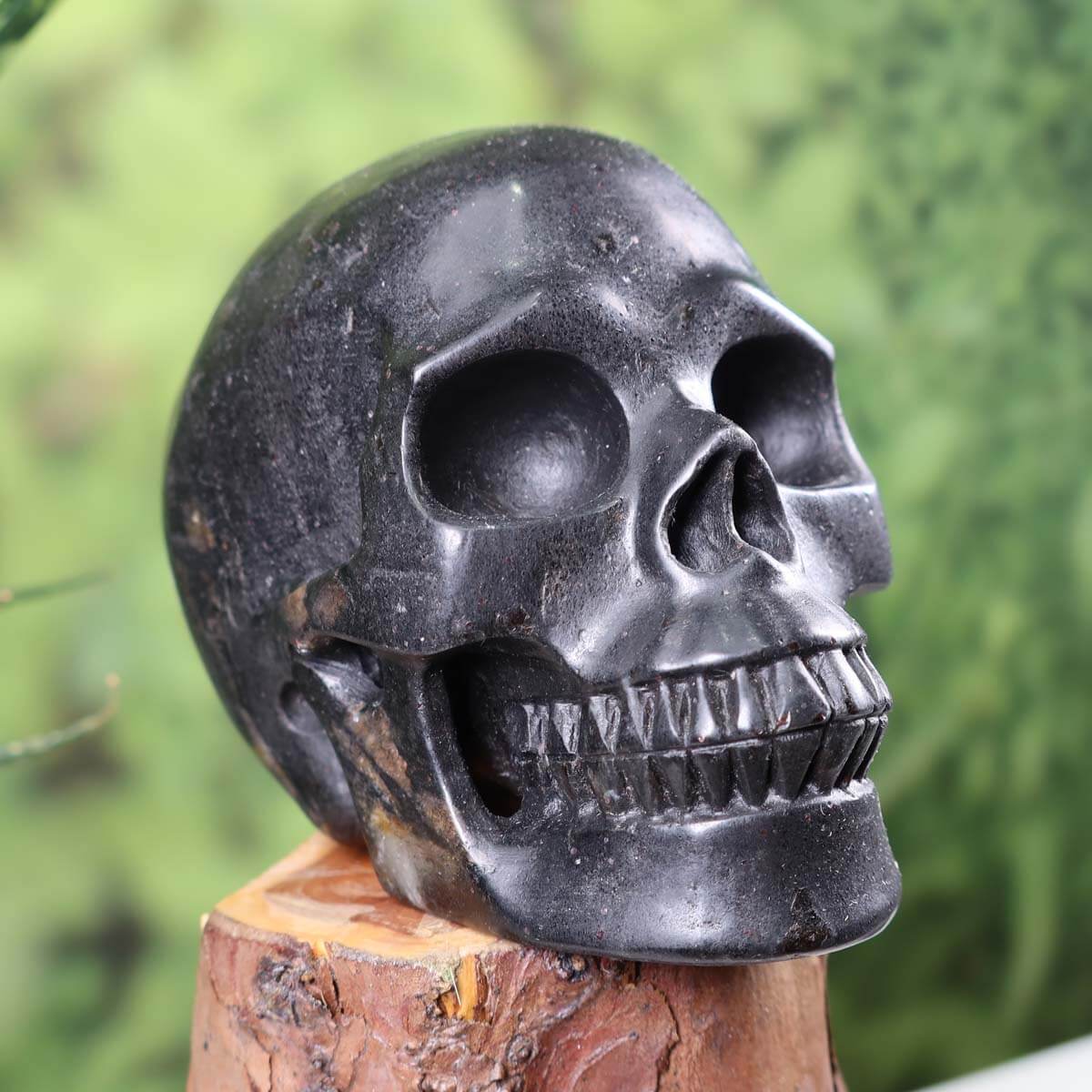 Handcrafted natural stone crystal skull, 12x10 cm, unique design, Vienna Minerals and Amethyst Druses, craftmanship showcase.