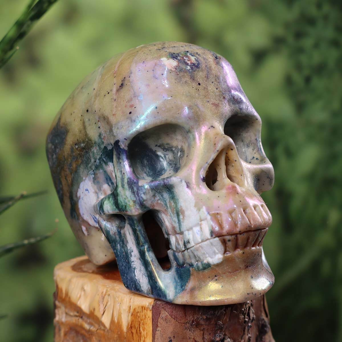Handcrafted natural stone crystal skull with unique patterns, 12x9 cm, Graz and Wiener Neustadt amethyst minerals.