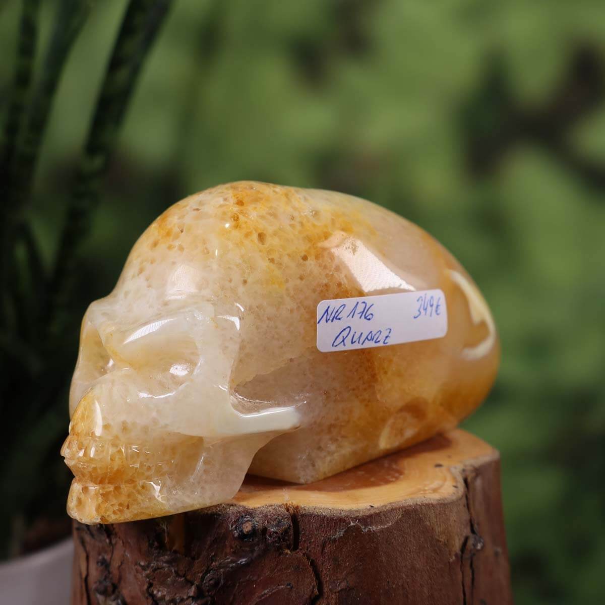 Handcrafted quartz crystal skull with unique shape, collectible item, natural stone, 12x5 cm, available at Steinwelten.