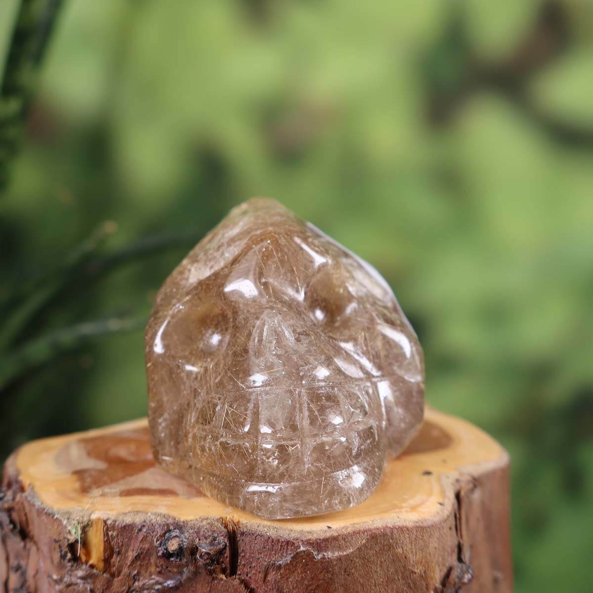 Handcrafted Rutil Quartz Crystal Skull, unique gemstone collectible, 6x5 cm, inspired by mineral and gemstone worlds.