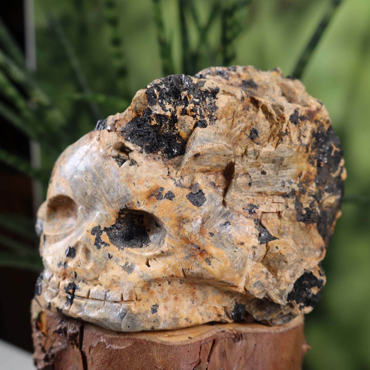 Handcrafted Tourmaline Gemstone Skull, unique crystal art piece, 10x8 cm exquisite collectible rock sculpture.