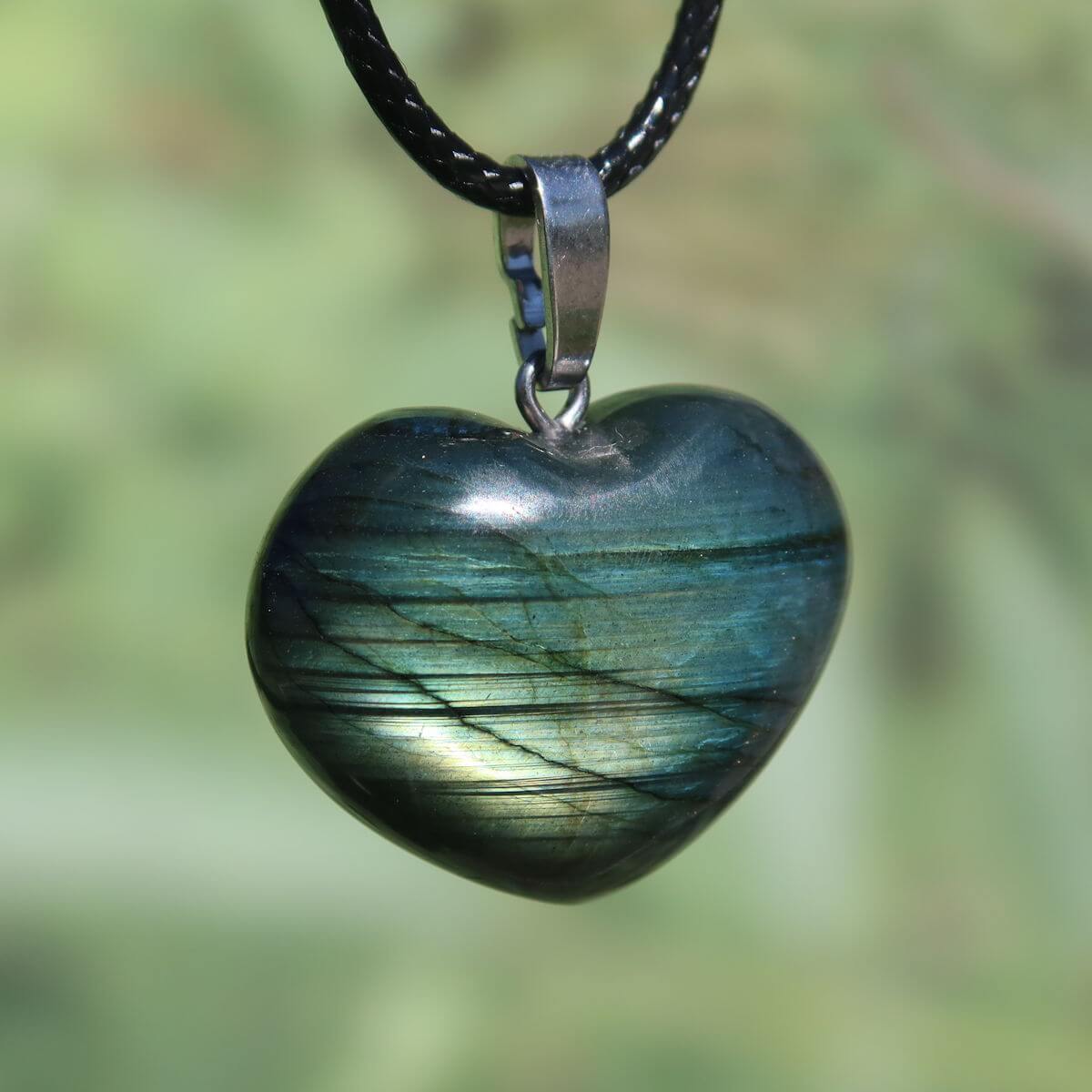 Labradorit heart pendant with blue and green hues on black cord, unique stone number 54 for intuition and spirituality.