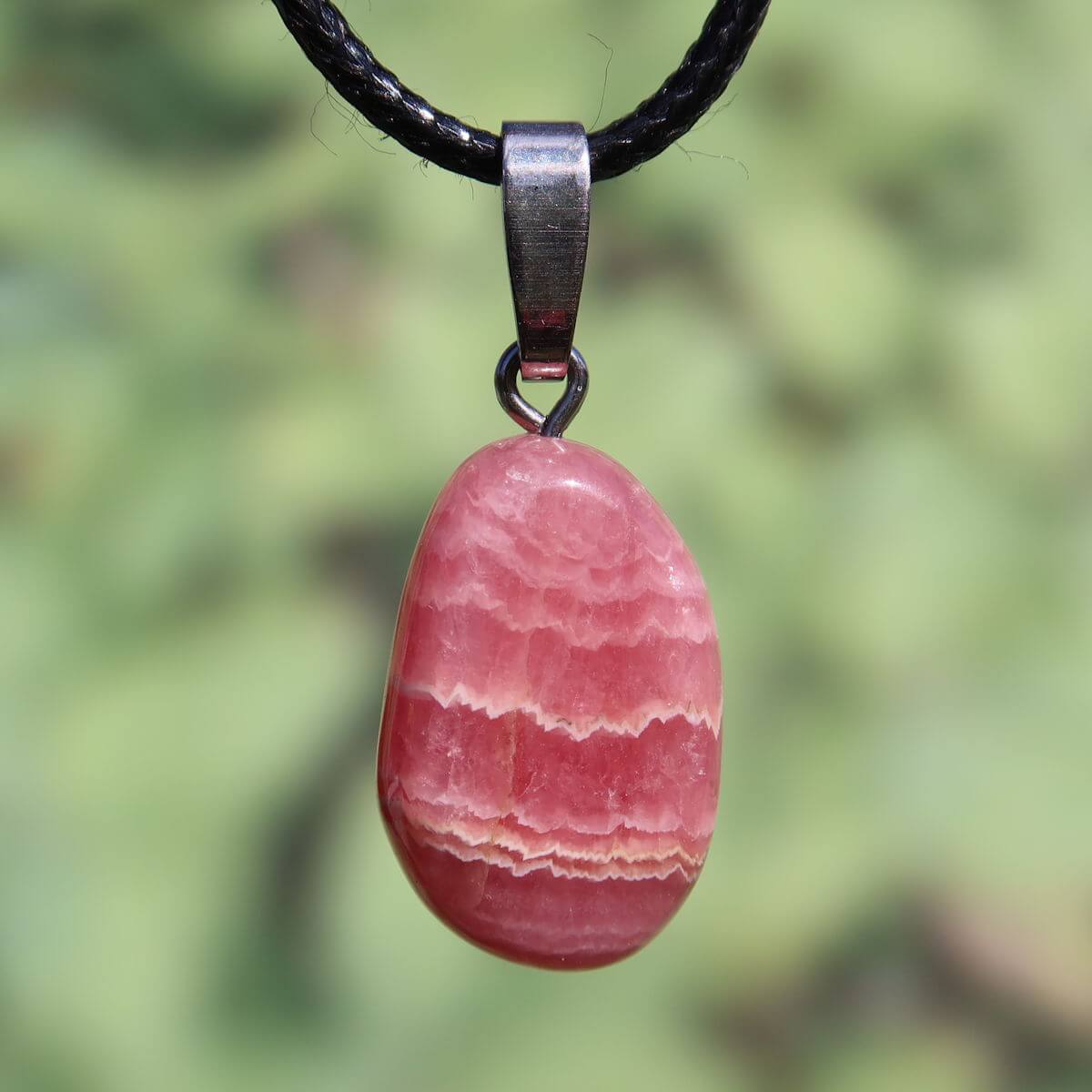 Rhodochrosit Anhänger 1A Qualität mit Silberöse, einzigartiges Schmuckstück für Lebensfreude und Energie, online kaufen in Graz.