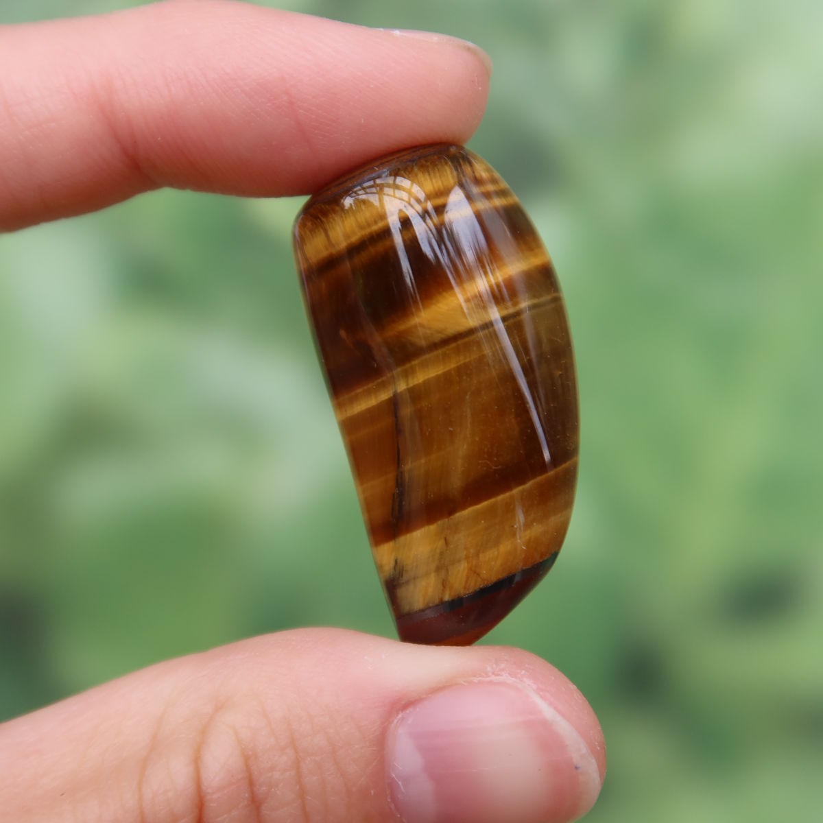 Tigerauge Handschmeichler 34mm - Selbstbewusstsein und Konzentration - Unikat Nr. 7, glänzendes Tigerauge mit markanten Streifen