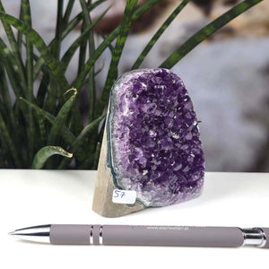 Uruguay Amethyst Mini Geode - 8x7x5cm in extra dark quality, displaying harmony and relaxation with deep purple crystals.