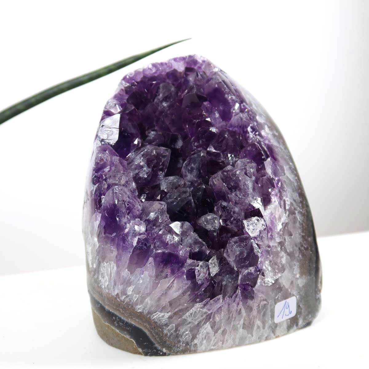 Uruguay Amethyst Mini Geode 9x13cm in dark purple, known for harmony and relaxation, with regular, sparkling crystals.