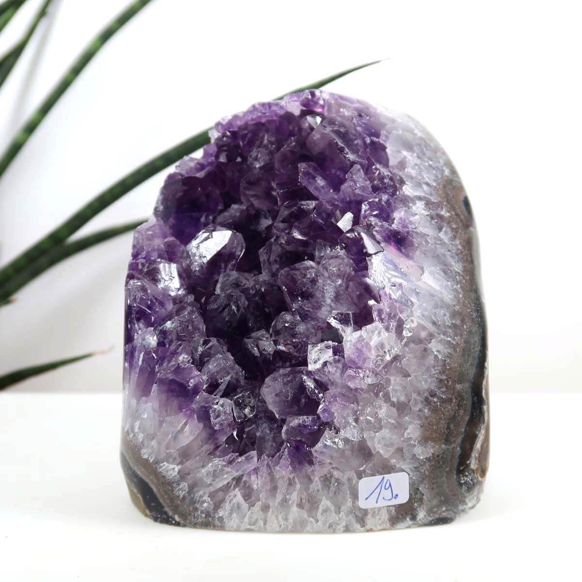 Uruguay Amethyst Mini Geode 9x13cm in dark purple, known for harmony and relaxation, with regular, sparkling crystals.