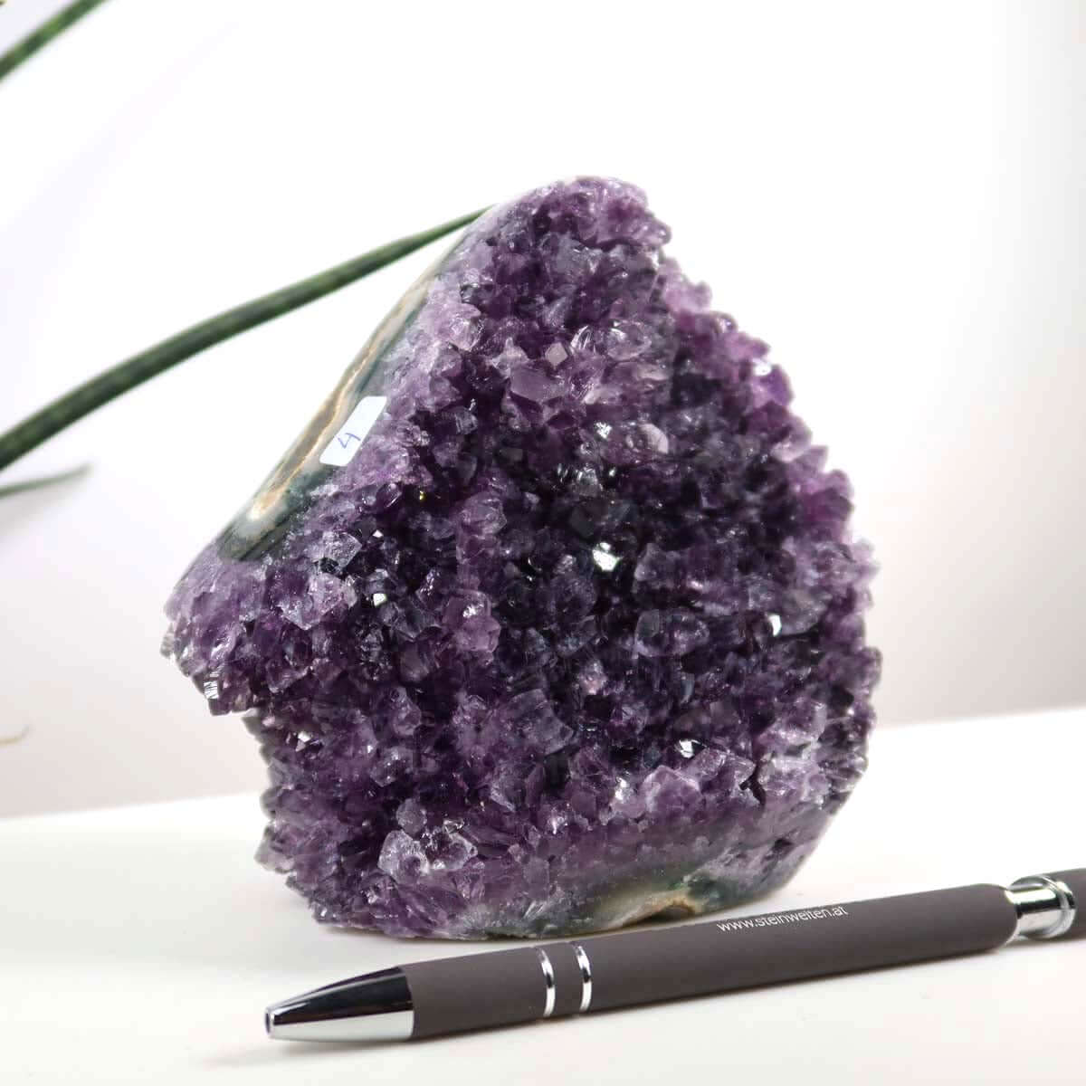 Uruguay Amethyst Mini Geode in deep purple, 11x12cm, showcasing natural crystal formations, harmonizing and relaxing energy.