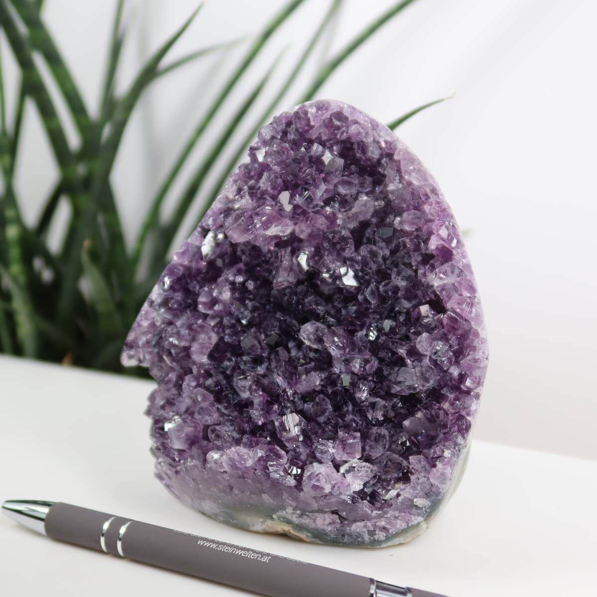 Uruguay Amethyst Mini Geode in deep purple, 11x12cm, showcasing natural crystal formations, harmonizing and relaxing energy.