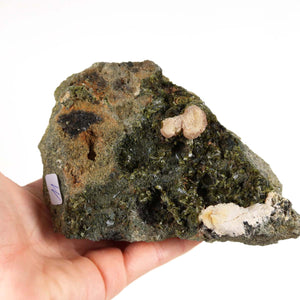 Hand holding natural Epidot and Prehnit crystal specimen from Morocco, ideal for mineral collectors and promoting self-love and relaxation.