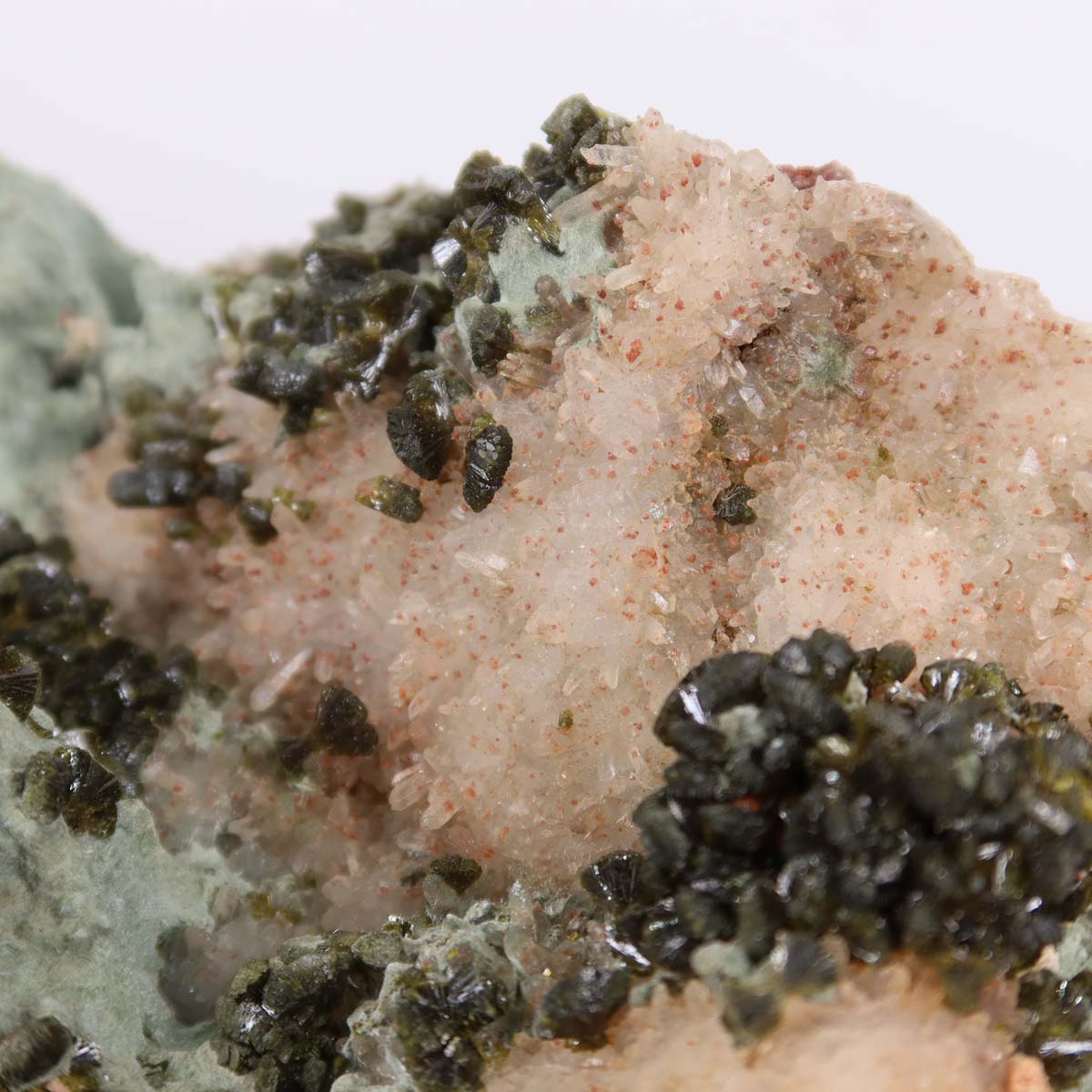 Epidote quartz crystal cluster with clear crystal points from Morocco, displaying natural beauty and unique structure for collectors.