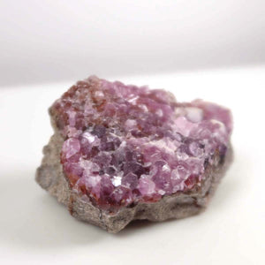 Cobaltocalcite raw stone in vibrant pink with natural crystal texture, 7x5x4 cm, ideal for collectors and mineral enthusiasts.