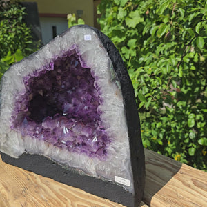 Amethyst Druse – Geode - 32x237x16cm und 22,6kg – Steinwelten OG - Nr. 356 displayed on wooden surface