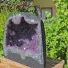 Amethyst Druse – Geode - 27x29x16cm und 13,8kg – Steinwelten OG - Nr. 326 displayed outdoors