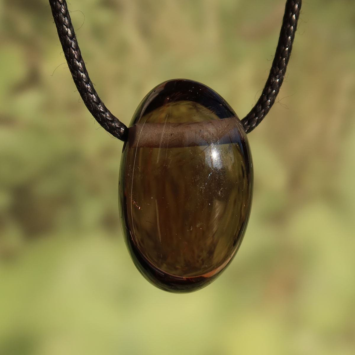 Rauchquarz gebohrt - Anti Stress Stein - Nr. 2, einzigartiger Anhänger mit warmen Brauntönen und natürlicher Tiefe.
